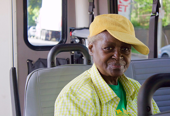 paratransit passenger seated on the vehicle