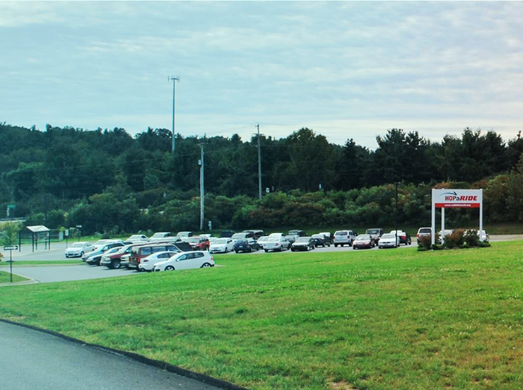 park and ride wide shot with vehicles