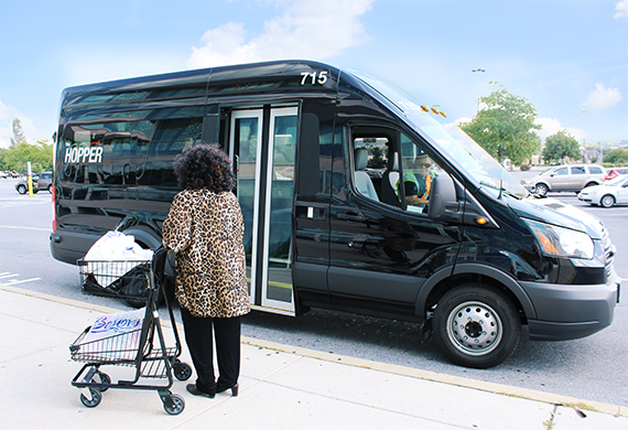 microtransit bus and passenger