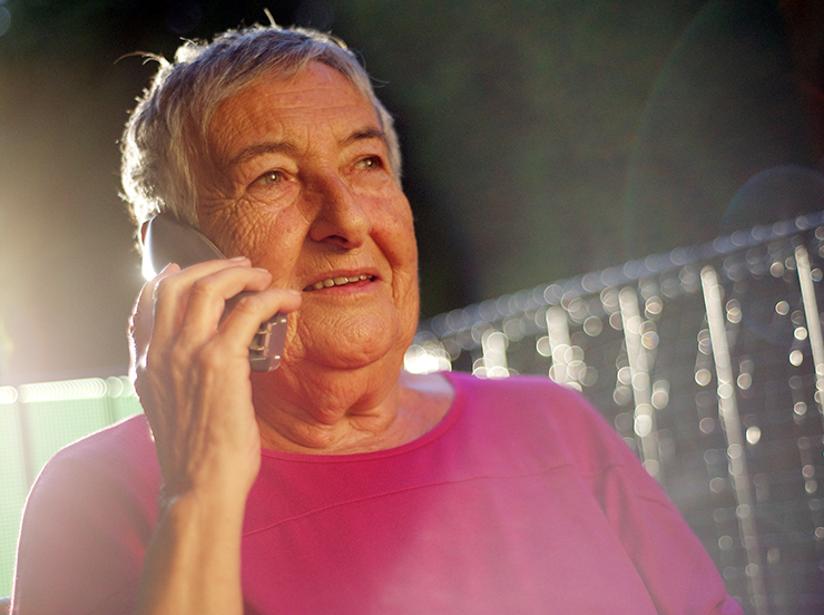 old woman talking to mobile