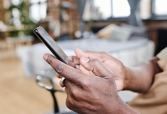 hands holding a mobile phone