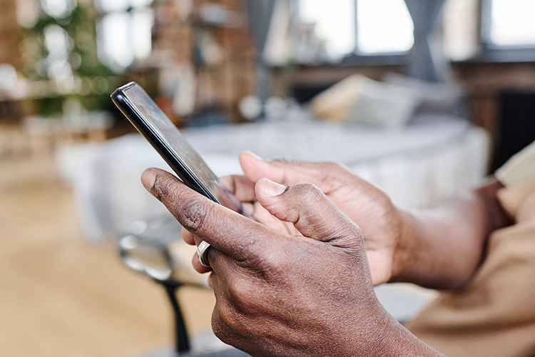 hands holding a mobile phone