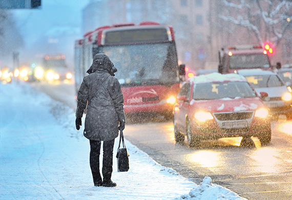 waiting for bus in snow